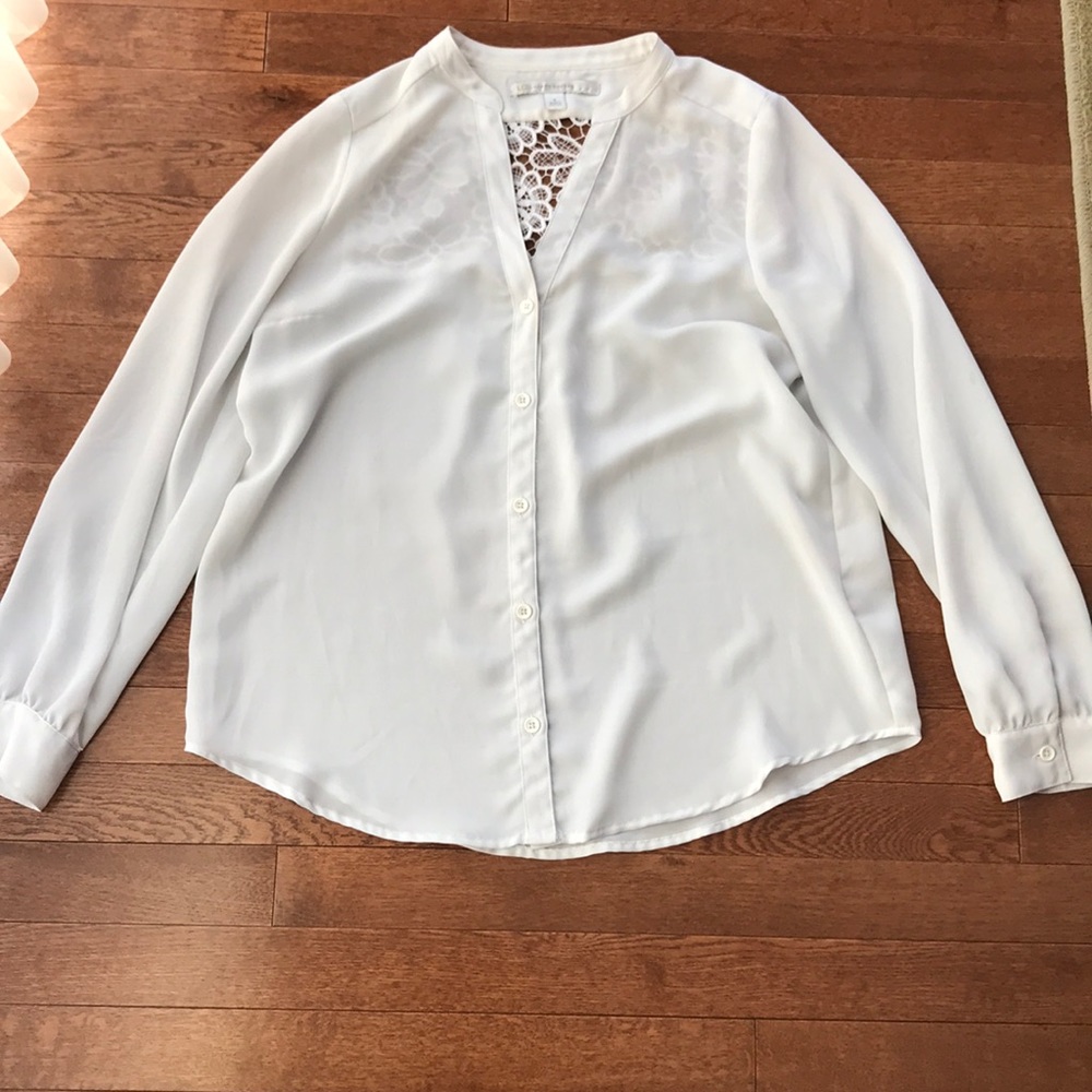 Fancy white blouse with lace detail in back